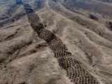 5,200 holes carved into a Peruvian mountain left by an ancient economy